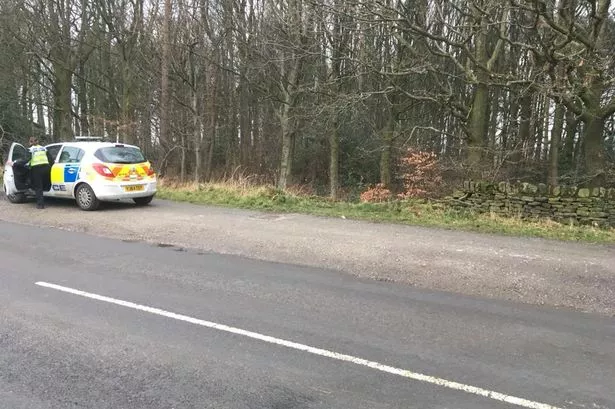 Manhunt launched after woman attacked in woodland at Storthes Hall